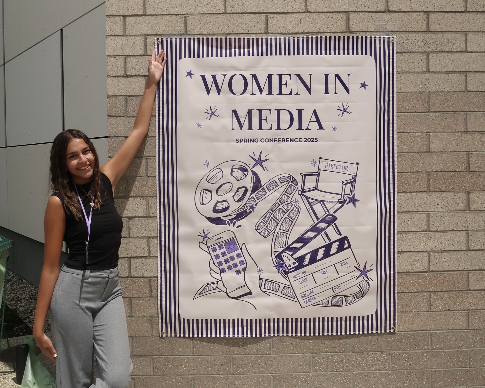 WIM at UCSB Head of Marketing with her merch for the Conference