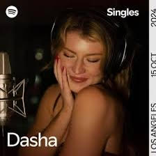 dasha smiling on album cover