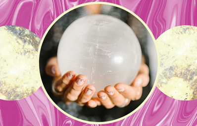 Woman holding a crystal ball.