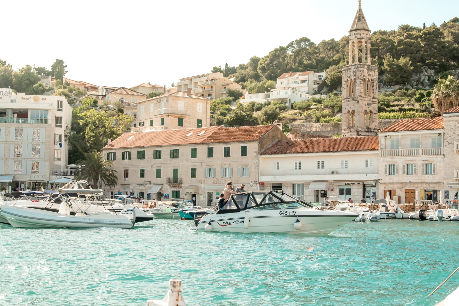 boats with scenic background crystal blue oceanjpg by Marcus Lfvenberg?width=698&height=466&fit=crop&auto=webp&dpr=4