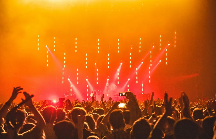 People enjoying concert