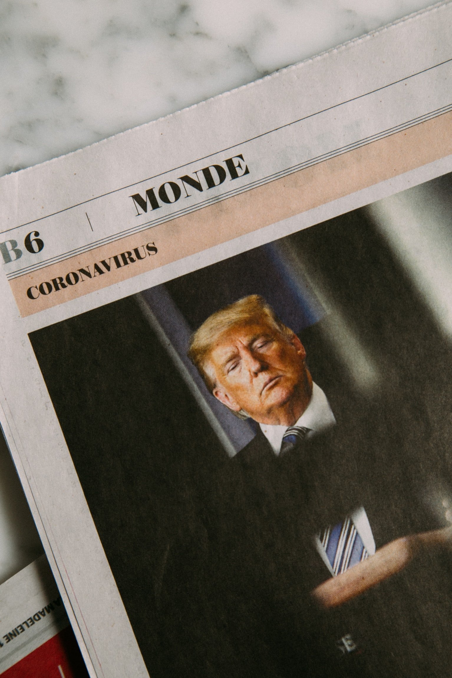 trump newspaperjpg by Charles Deluvio from Unsplash
