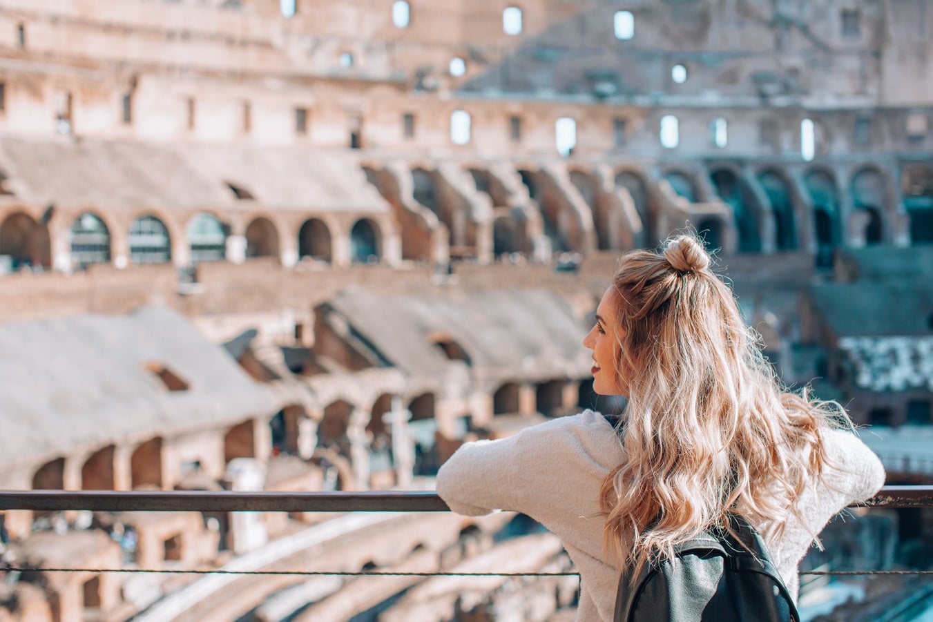 Woman visiting the Colosseum in Rome, Italy