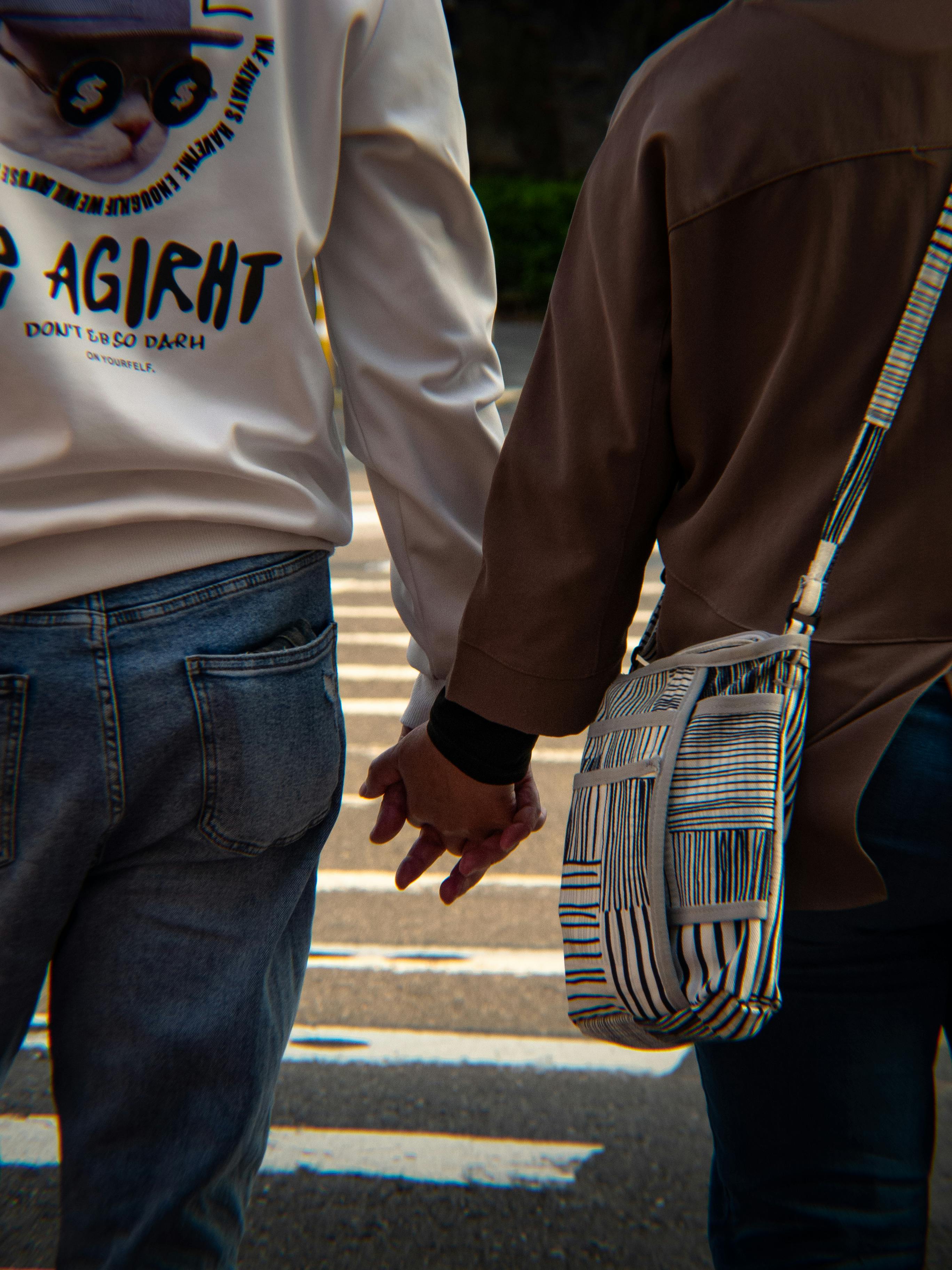 Couple holding hands