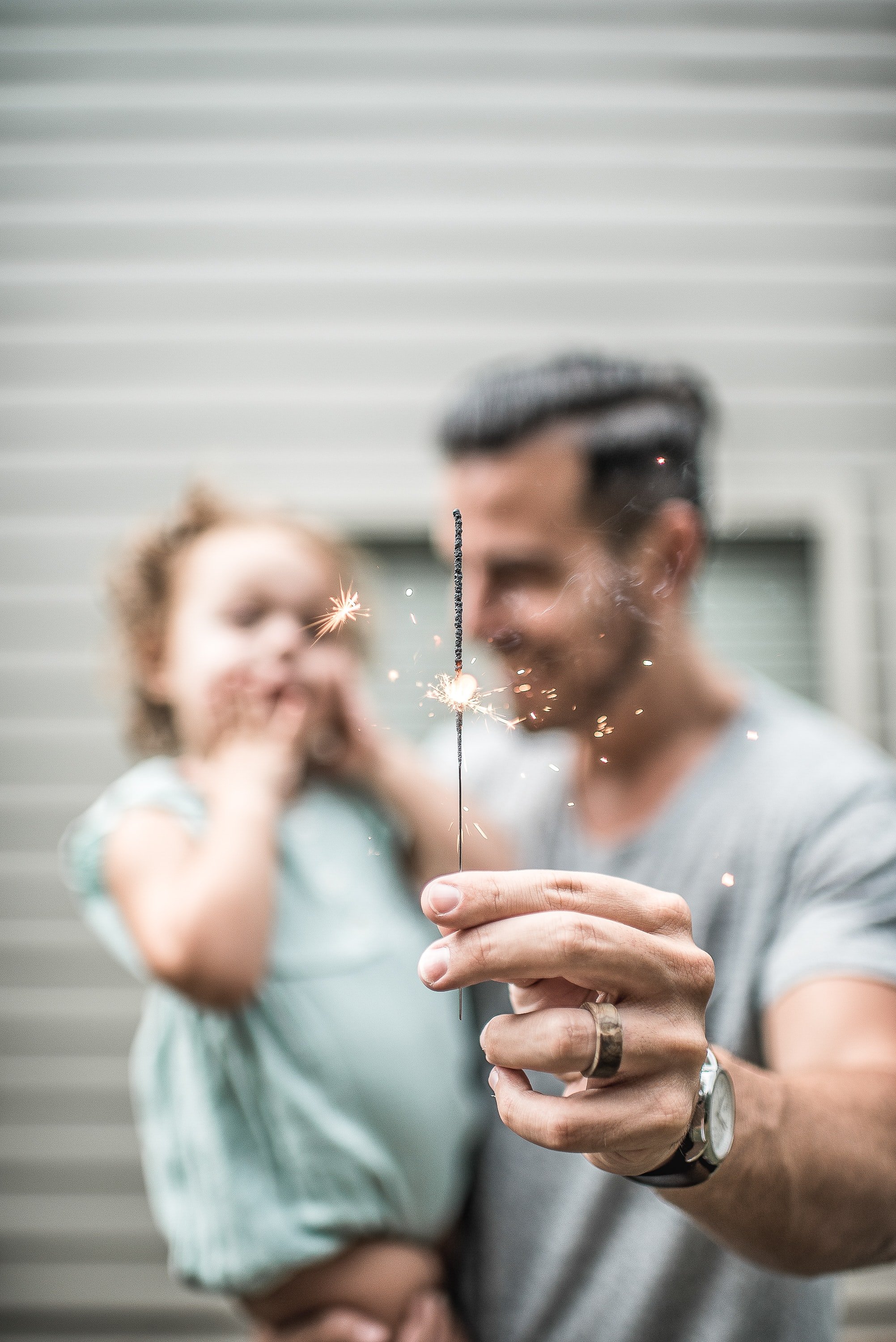 father and daughter with sparklers by Caleb Jones from Unsplash?width=698&height=466&fit=crop&auto=webp&dpr=4