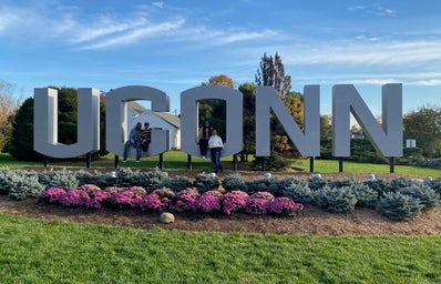 picture of UConn sign in the front of campus
