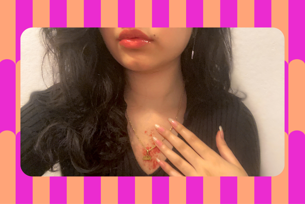 photo of the author wearing her \"allah\" pendant necklace