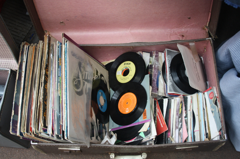 Record collection in pink suitcase