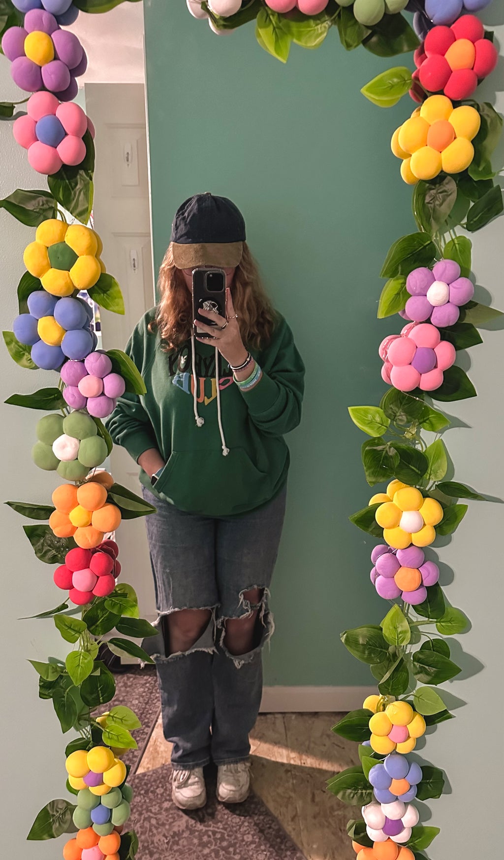 Me standing in the decorated mirror that I made