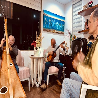 the writer's family playing llanero music