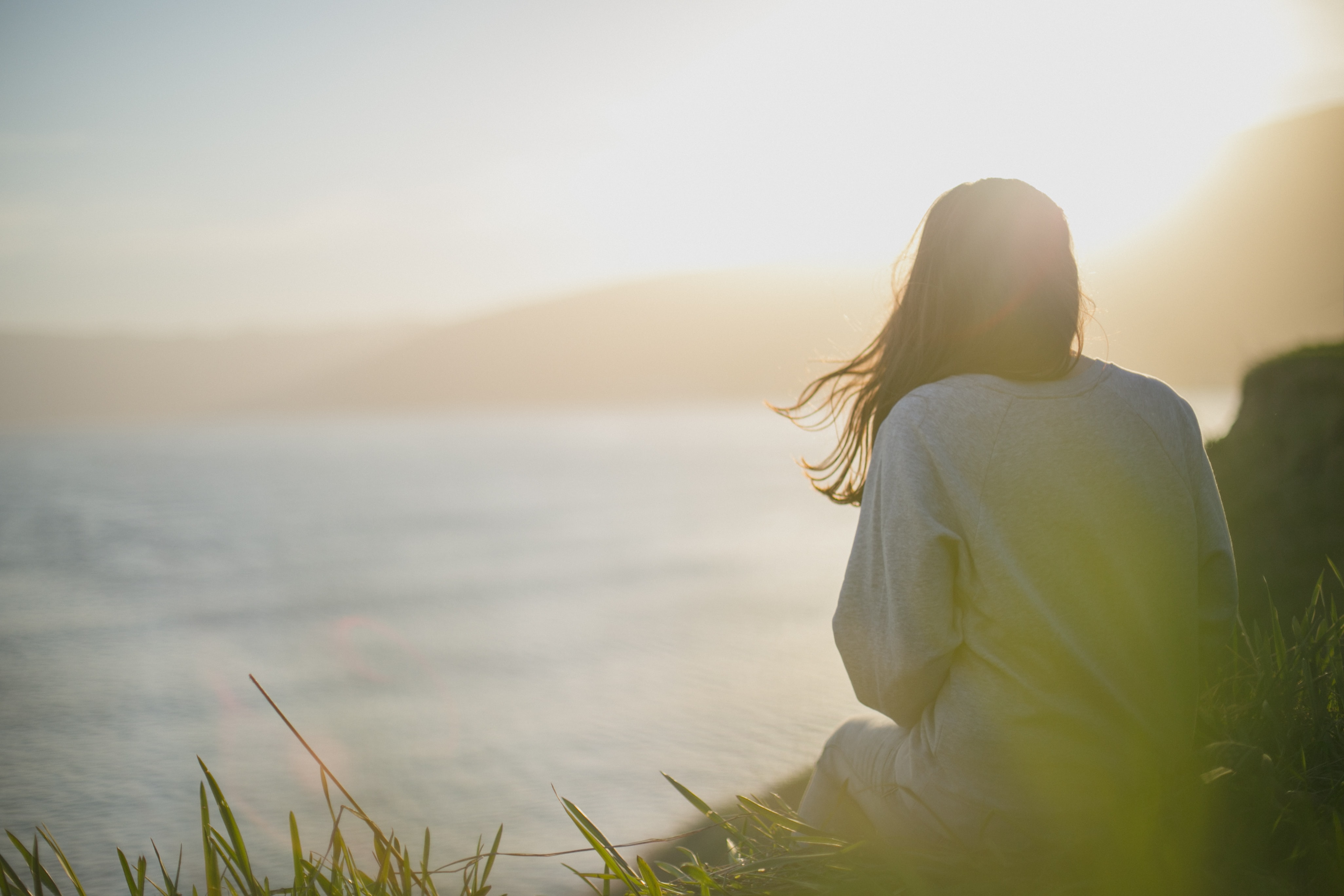Woman looking out at the water.