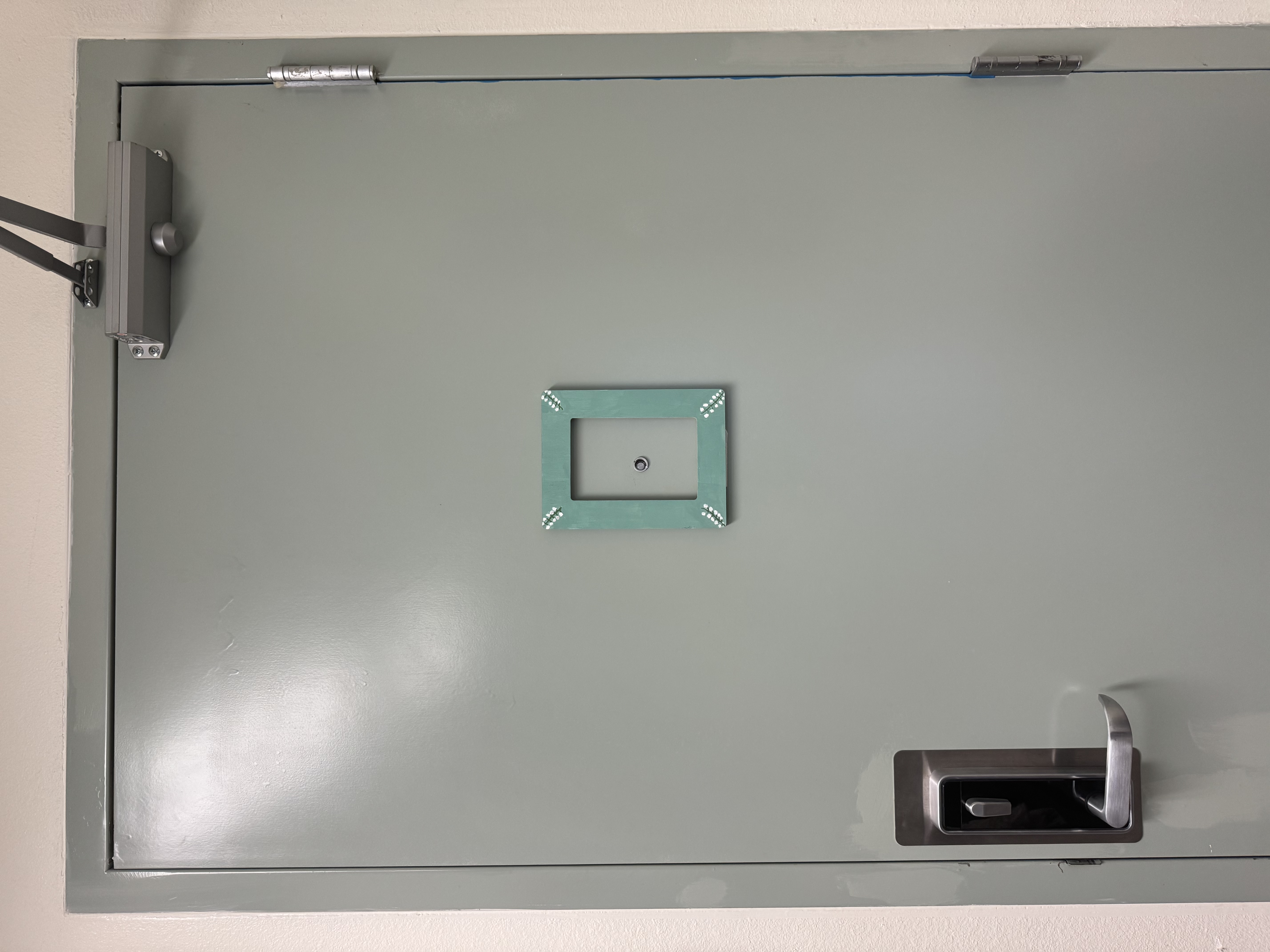 Painted frame around door peep hole