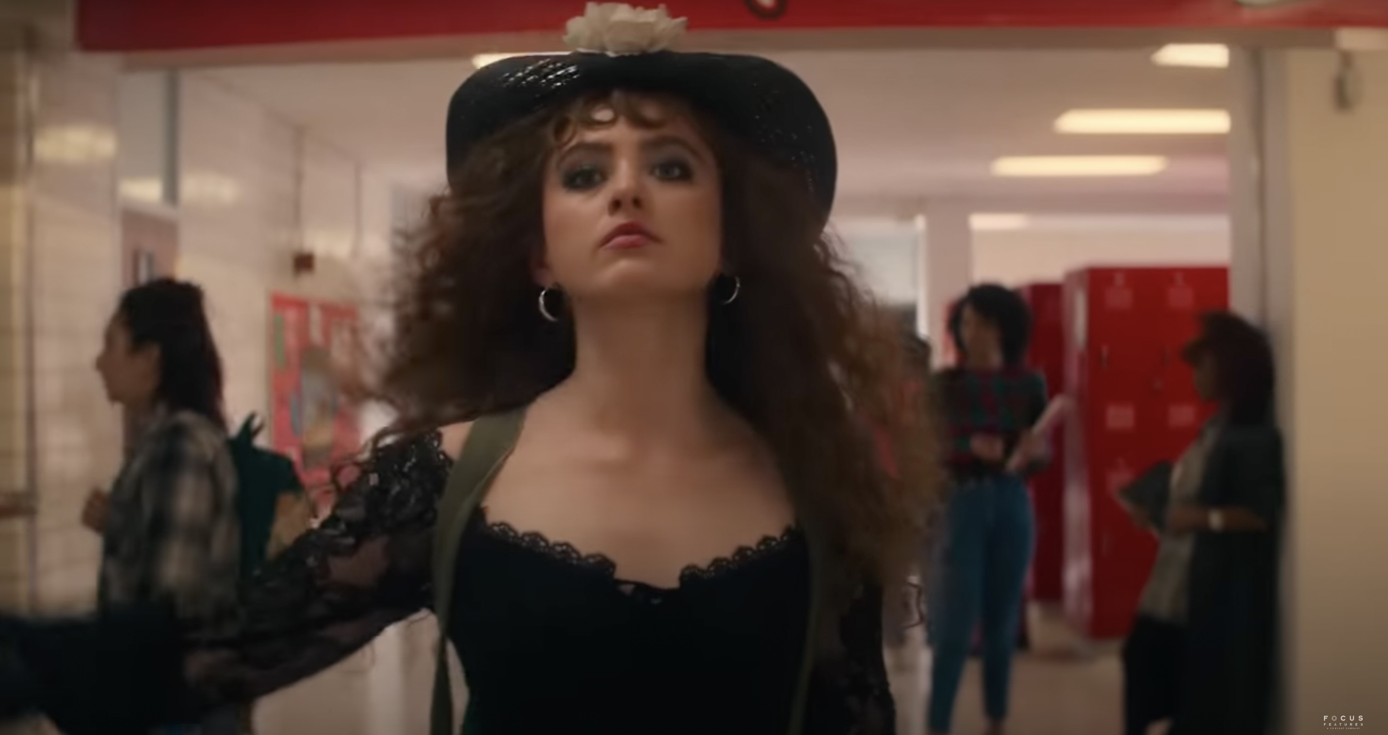 Lisa Frankenstein Lisa walking down hall in black dress