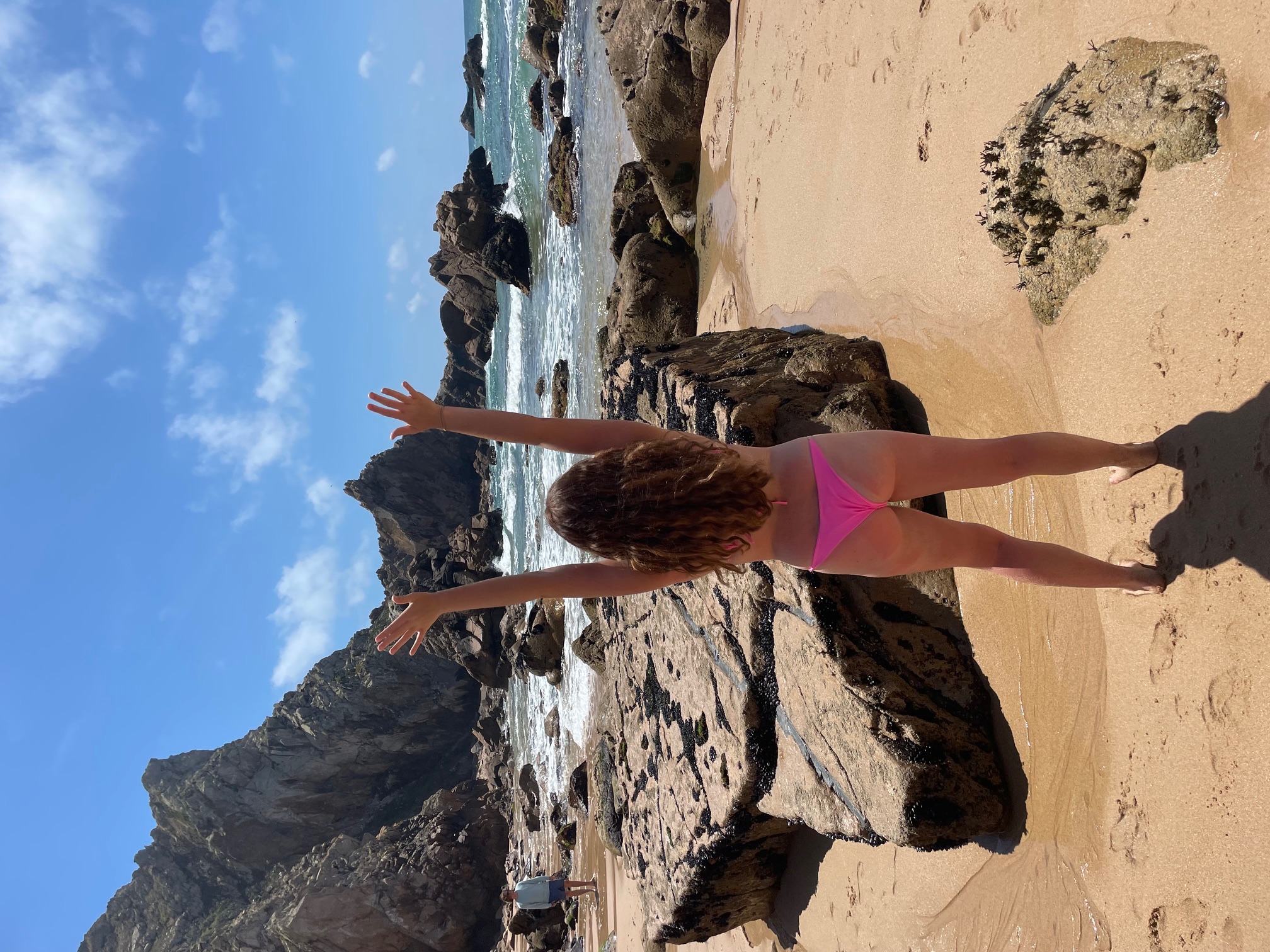 woman at Praia de Ursa (beach in Lisbon, Portugal)