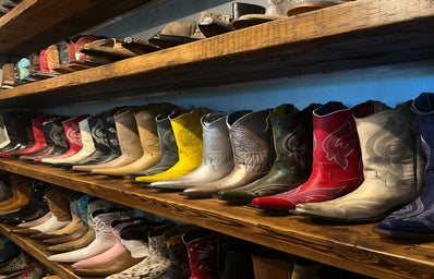 Cowboy boots displayed on shelves