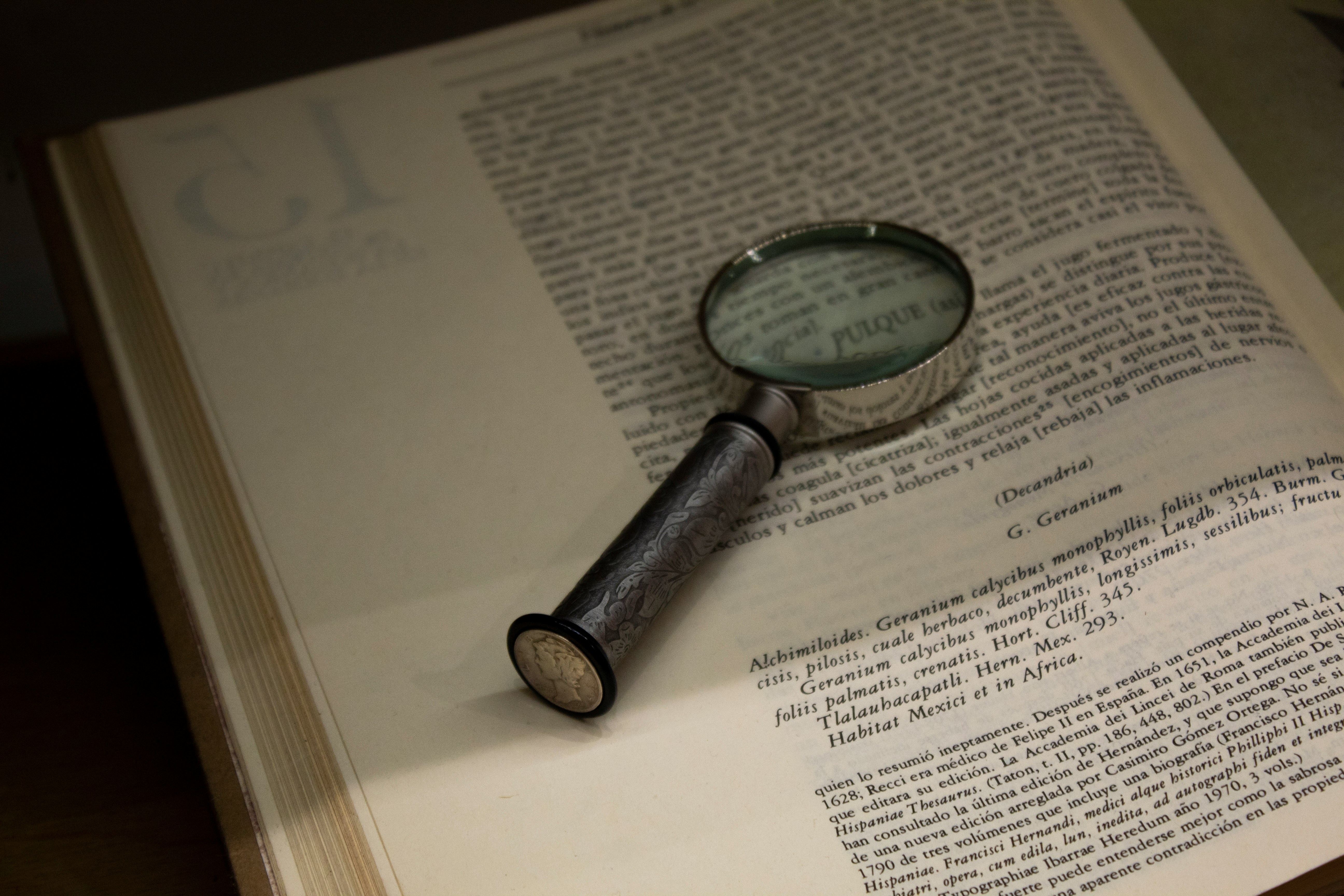 Magnifying Glass Sitting On a Book.