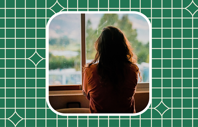 woman looking out of the window