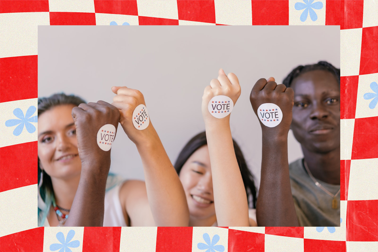 people with vote stickers