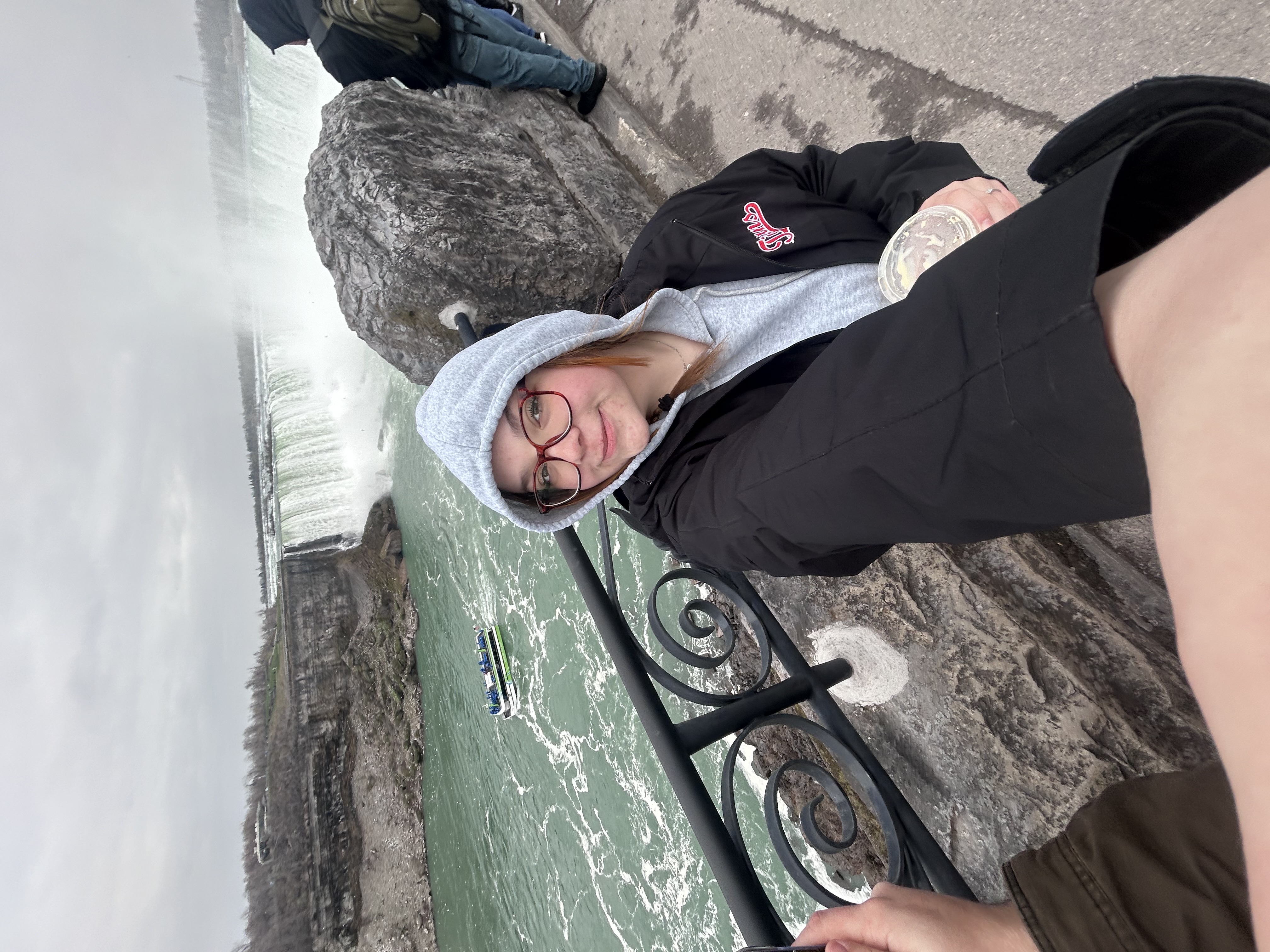 Woman in front of Niagara Falls