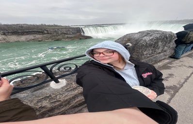 Woman in front of Niagara Falls