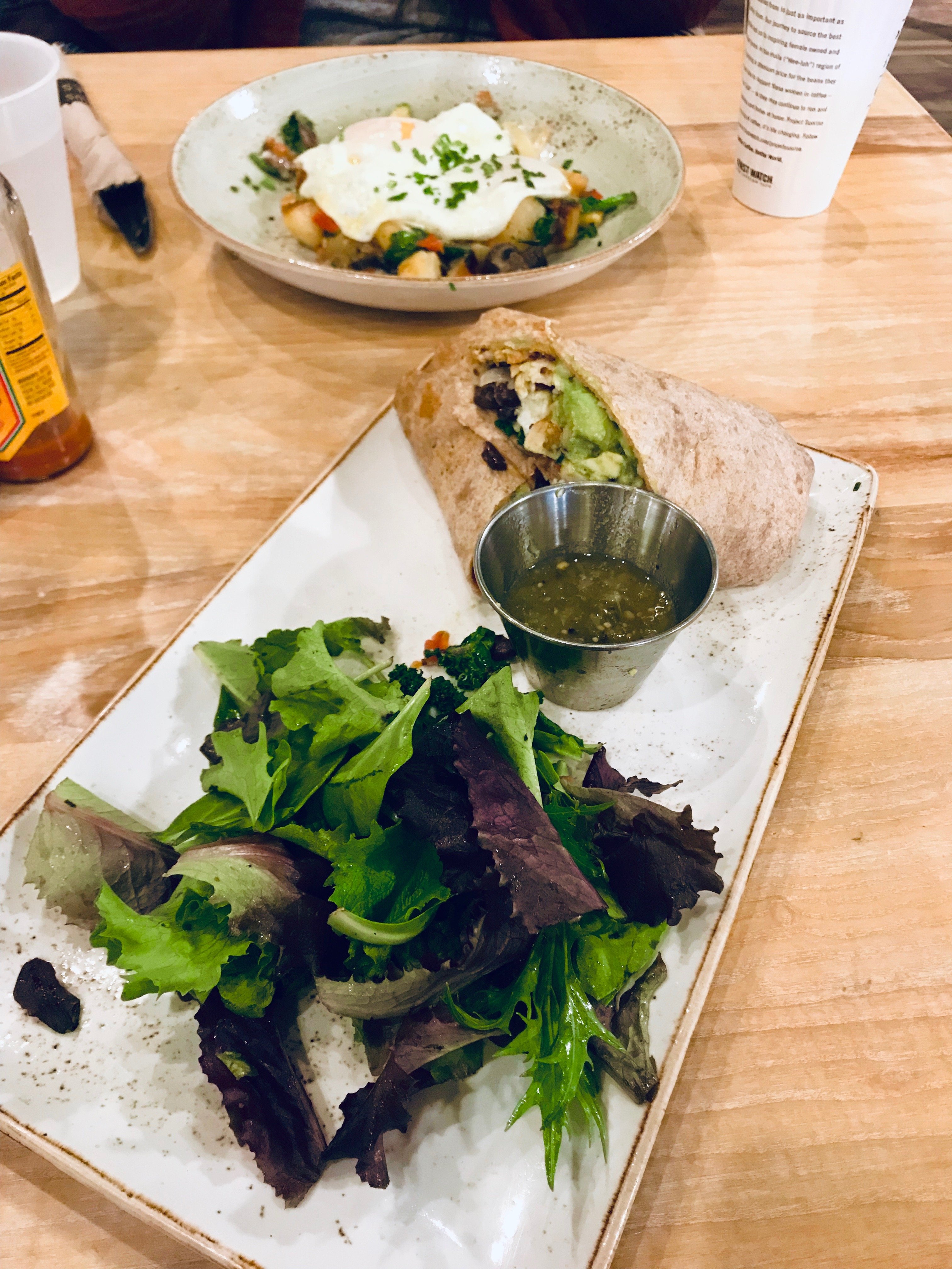 sandwich wrap with salad on a long plate