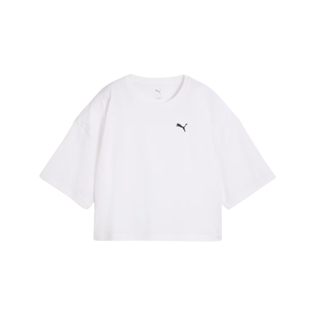 White oversized T-shirt featuring a small black logo on the left chest. The shirt has a relaxed fit with short sleeves, conveying a casual, minimalist style.