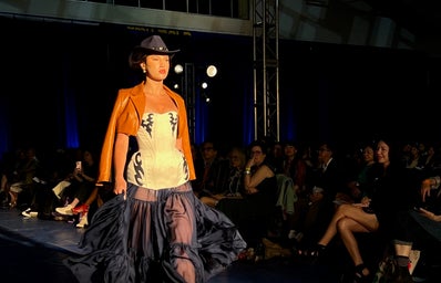 Model showcasing Mikaila Taliana\'s designs on the runway.