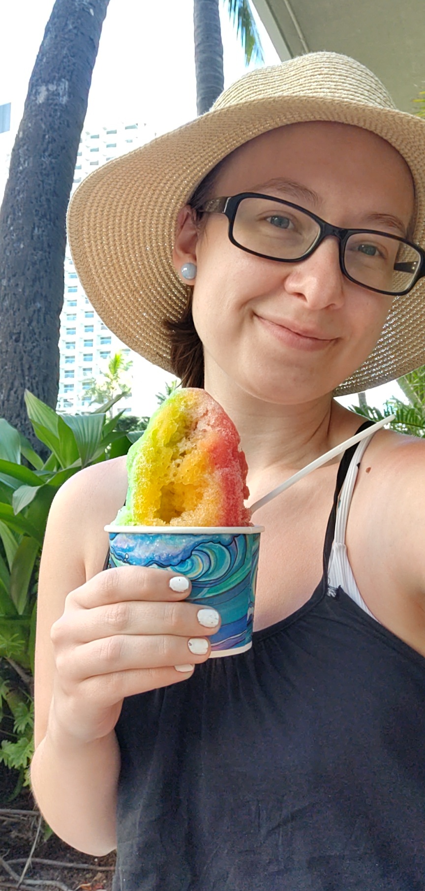 Cheyenne Halberg holding her Shave Ice while in Waikiki, Hawaii