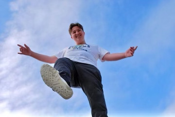 Trey Morris (TREYMO) over a blue sky background