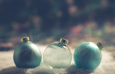 christmas baubles on fake snow