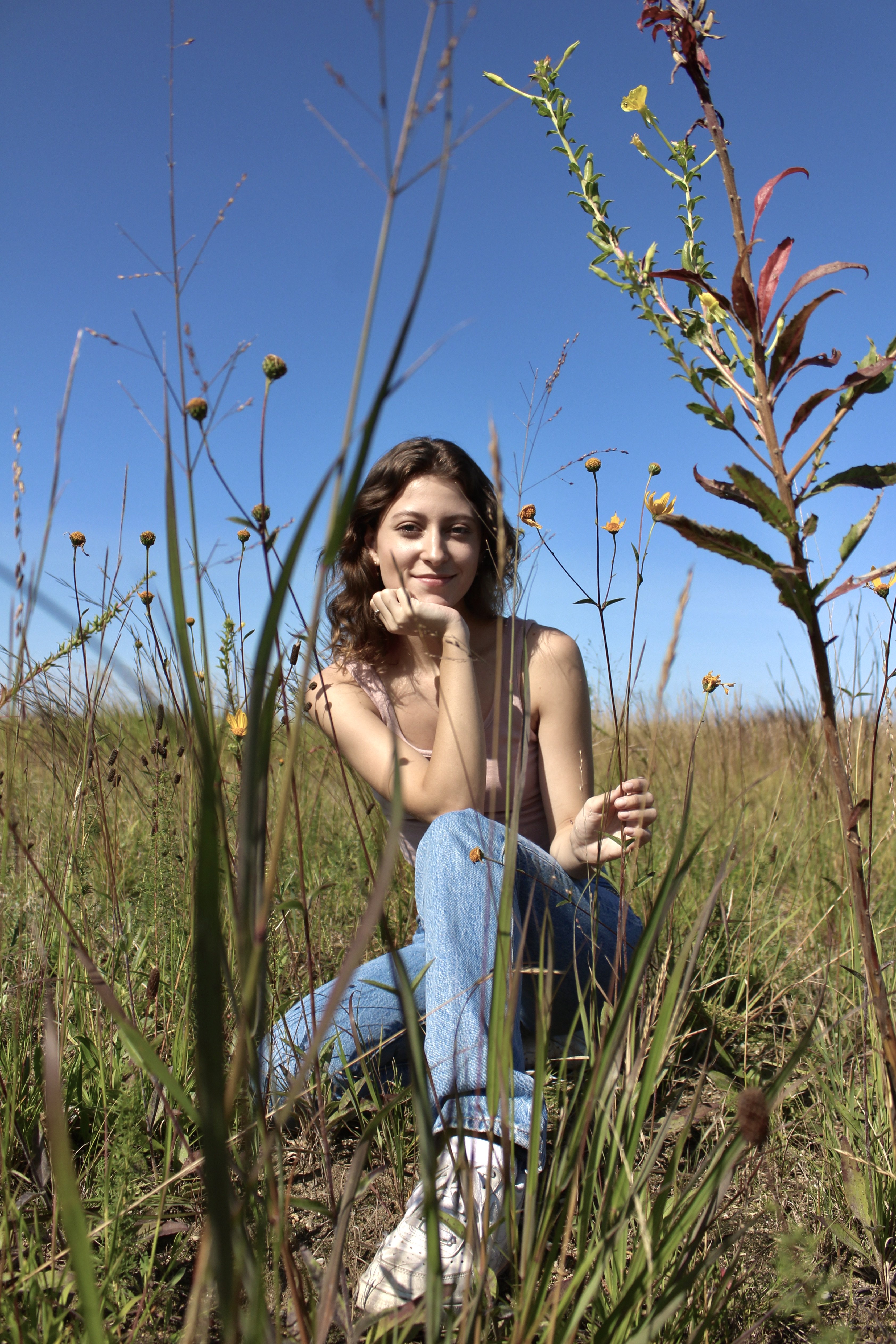 Girl in wildflower field