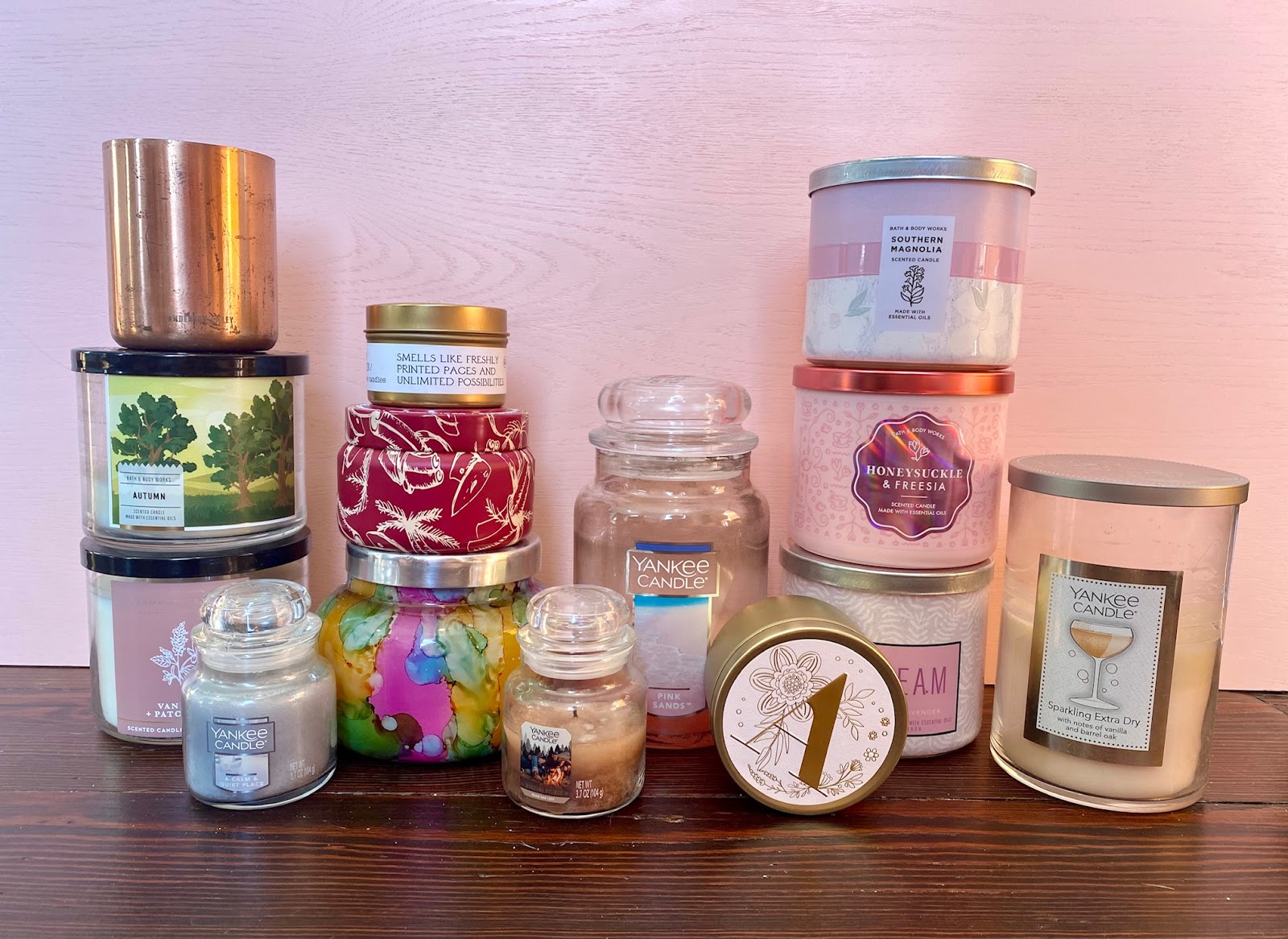 several stacks of candles on a desk