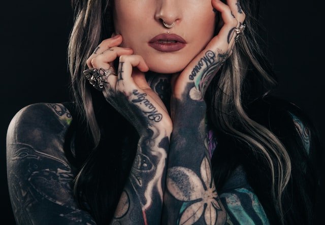 woman covered in tattoos by Unsplash?width=698&height=466&fit=crop&auto=webp&dpr=4