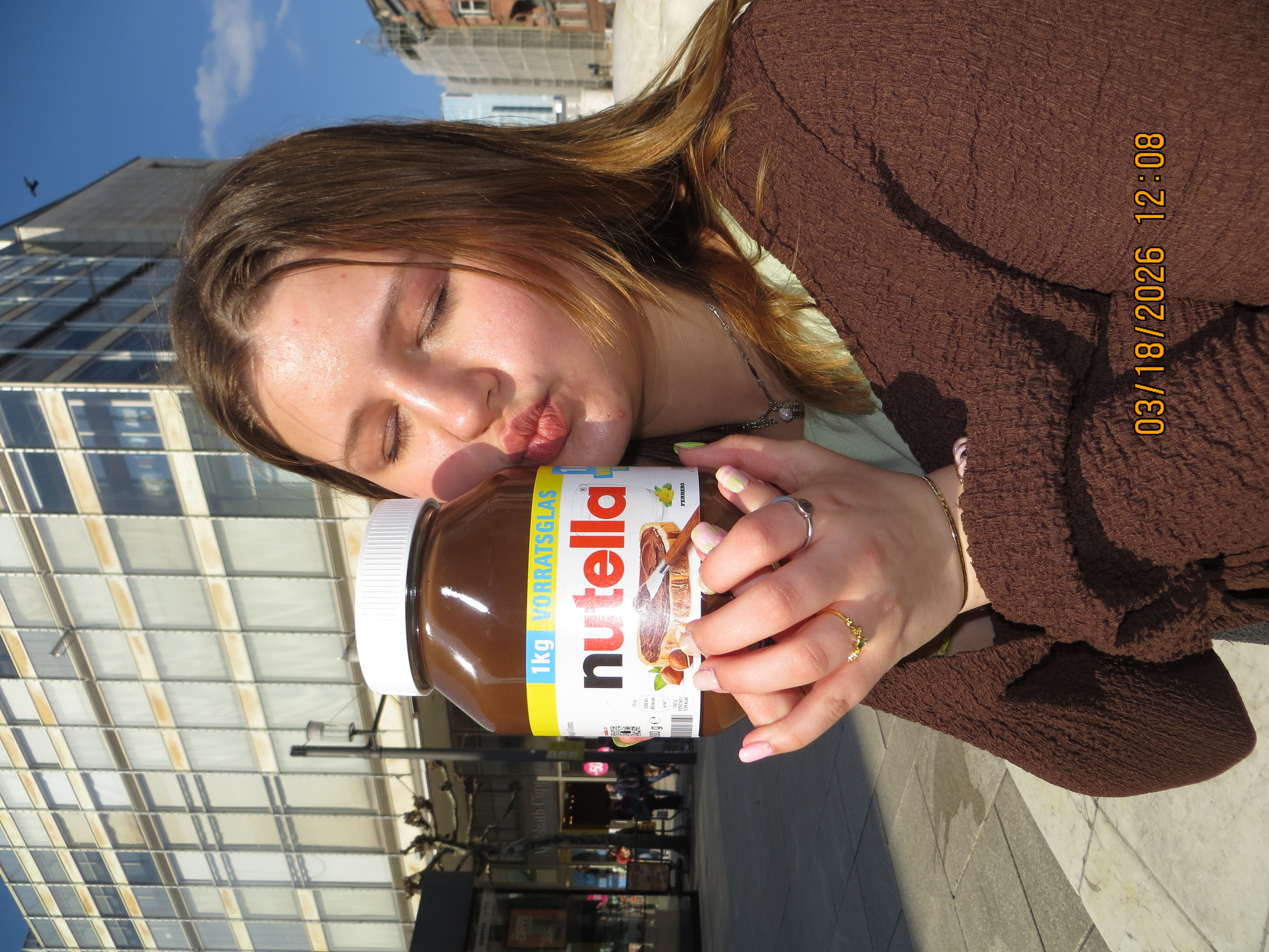 A photo of me kissing a jar of German Nutella