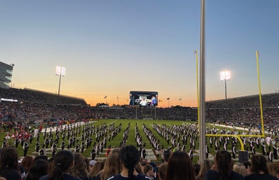 uconn football game with band on field