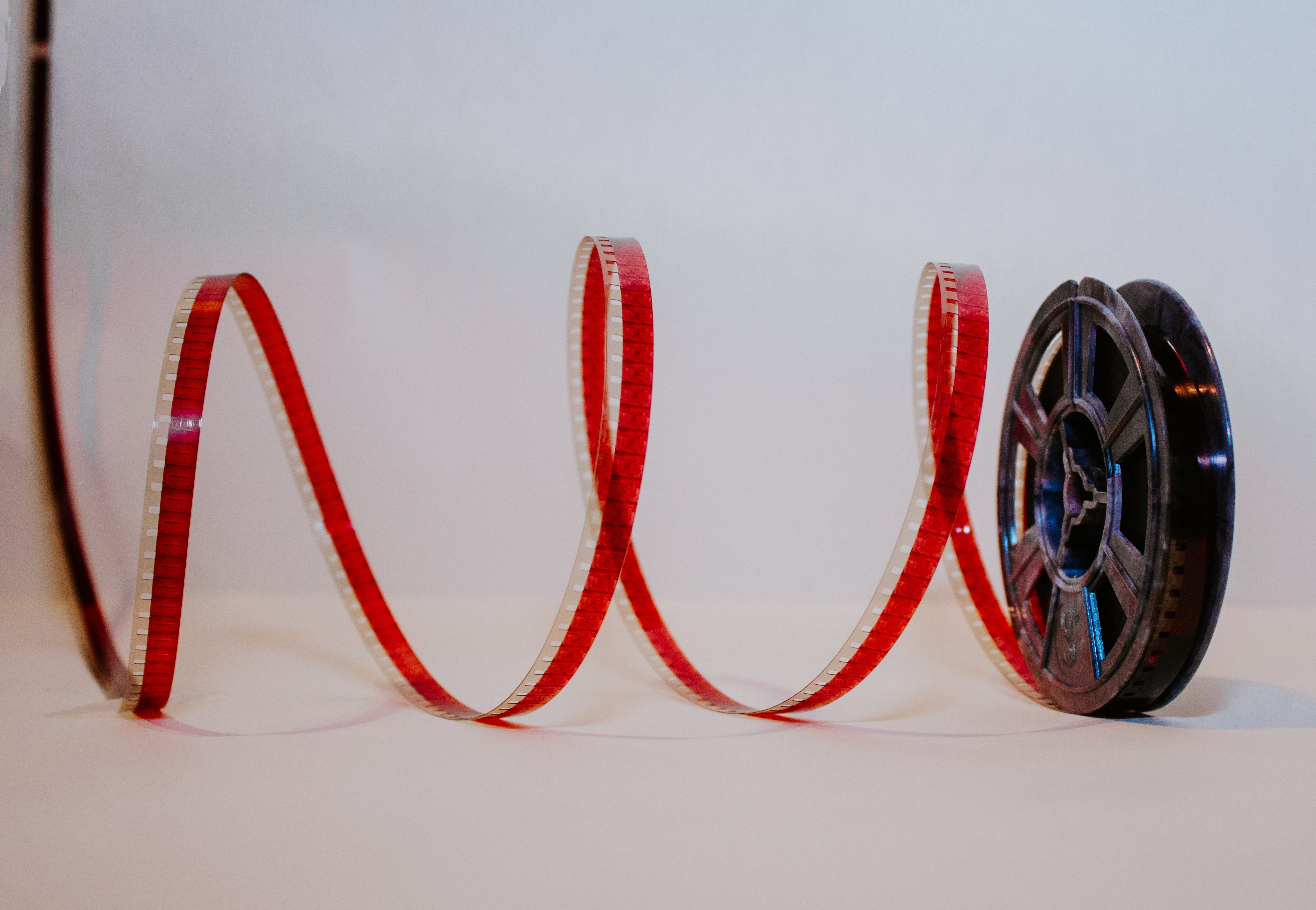 black and red film roll by Denise Jans