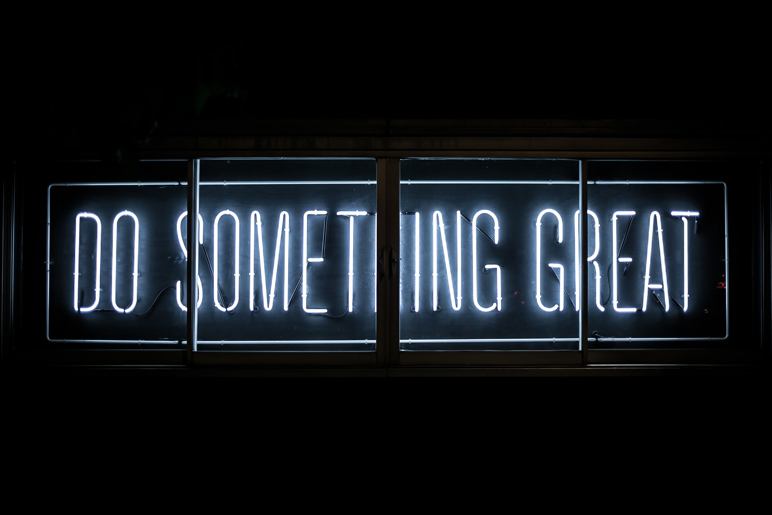 do something great neon sign by Clark Tibbs?width=698&height=466&fit=crop&auto=webp&dpr=4