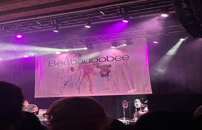 Beabadoobee banner at her concert at the Aztec Theatre in San Antonio, TX on March 31, 2023 featuring her Beatopia Album Cover.