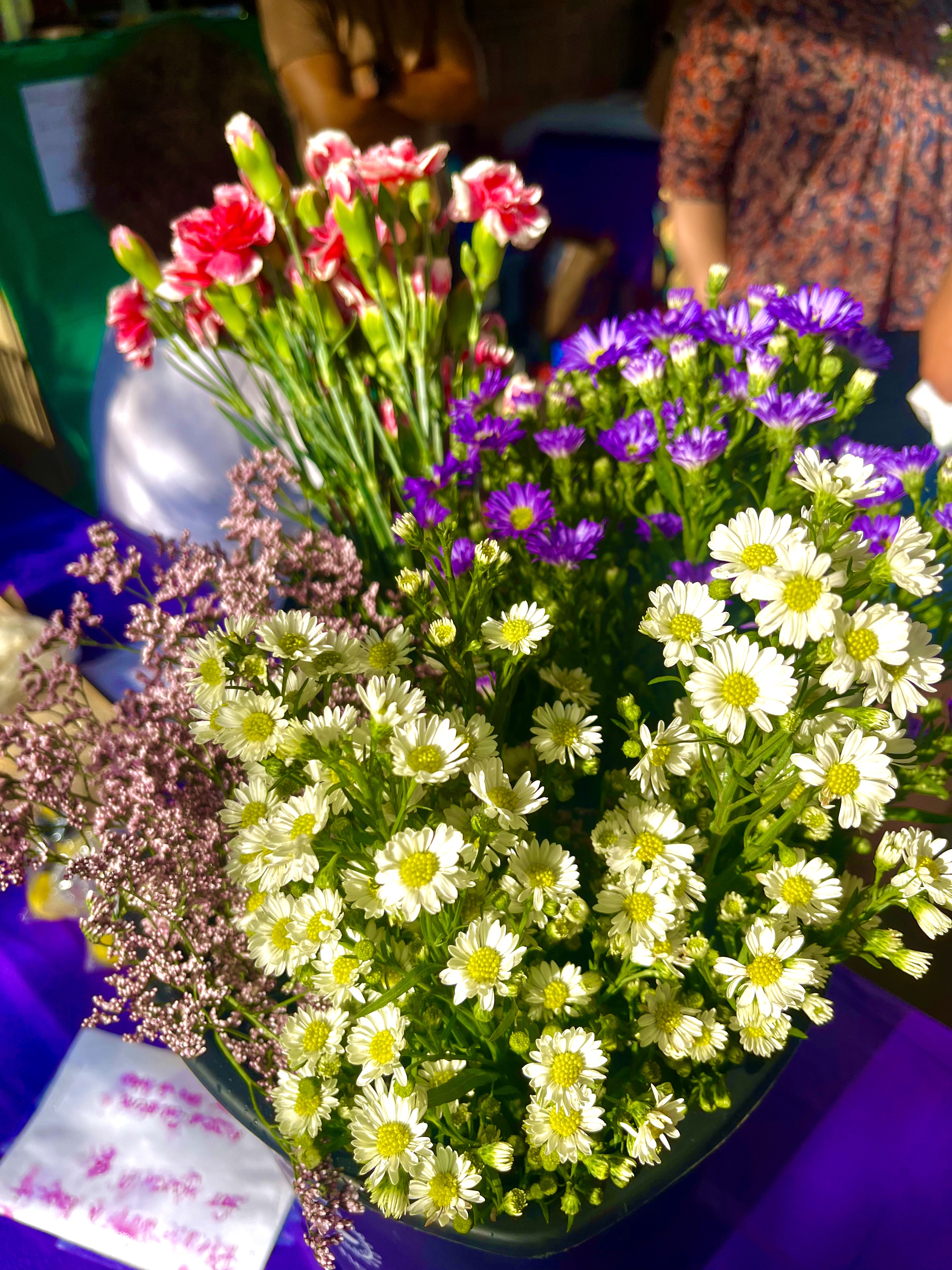 A bouquet of flowers on a bright sunny day