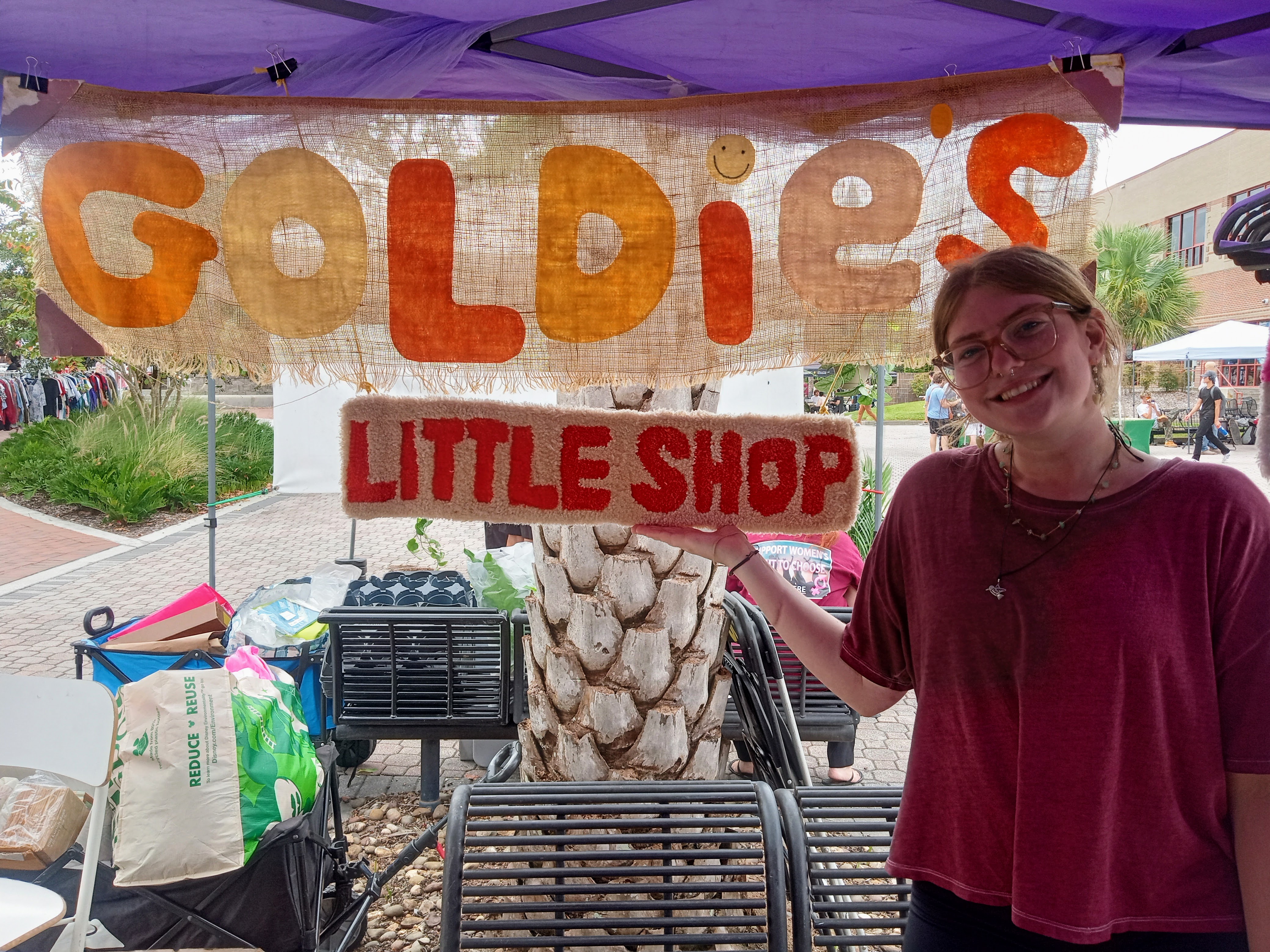 original photo of Goldie\'s Little Shop storefront and owner