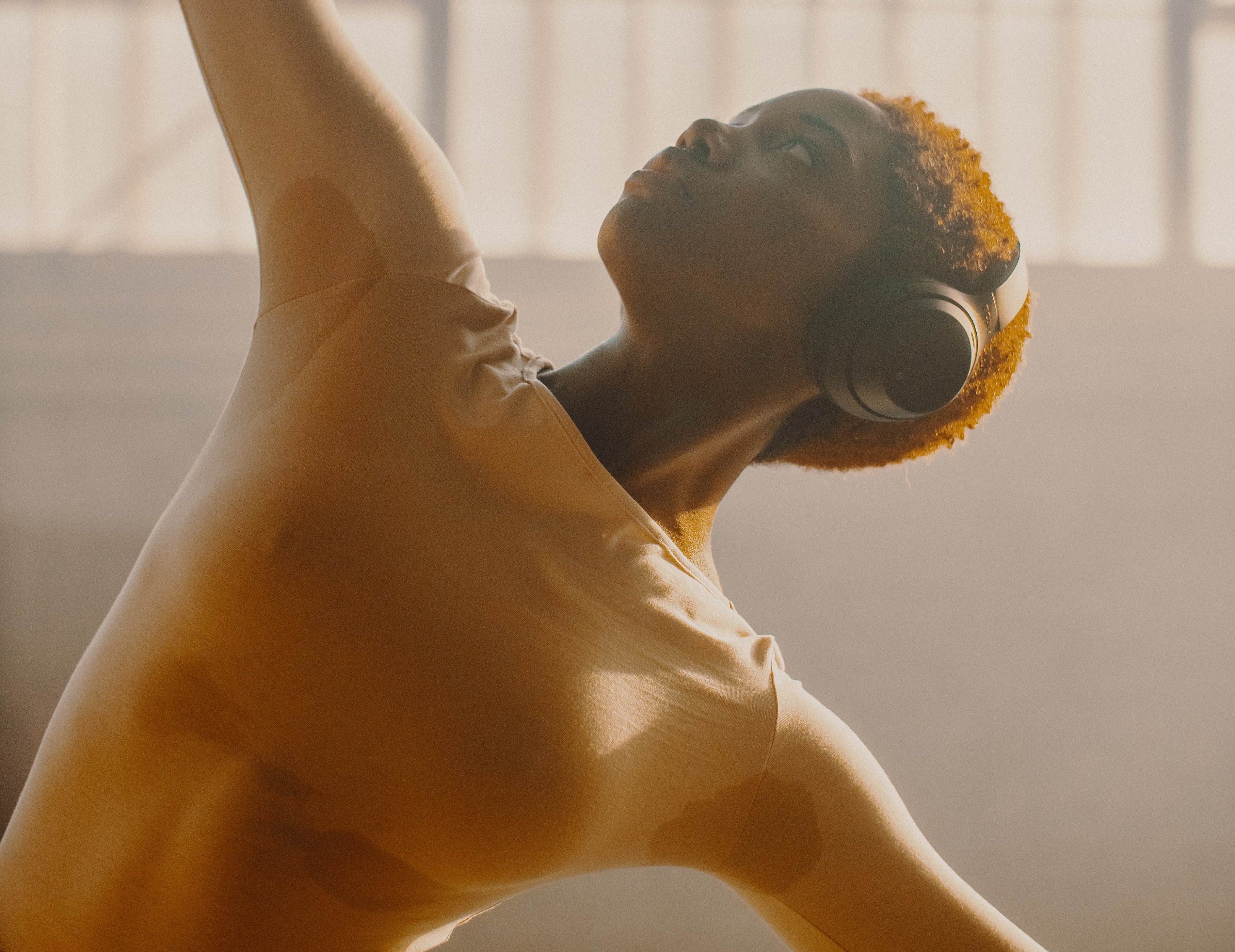 woman sweating and stretching by Avi Richards on Unsplashed?width=698&height=466&fit=crop&auto=webp&dpr=4