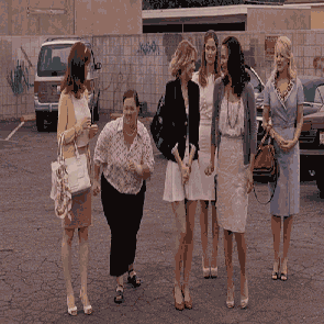 A gif of the cast of Bridesmaid running towards a location