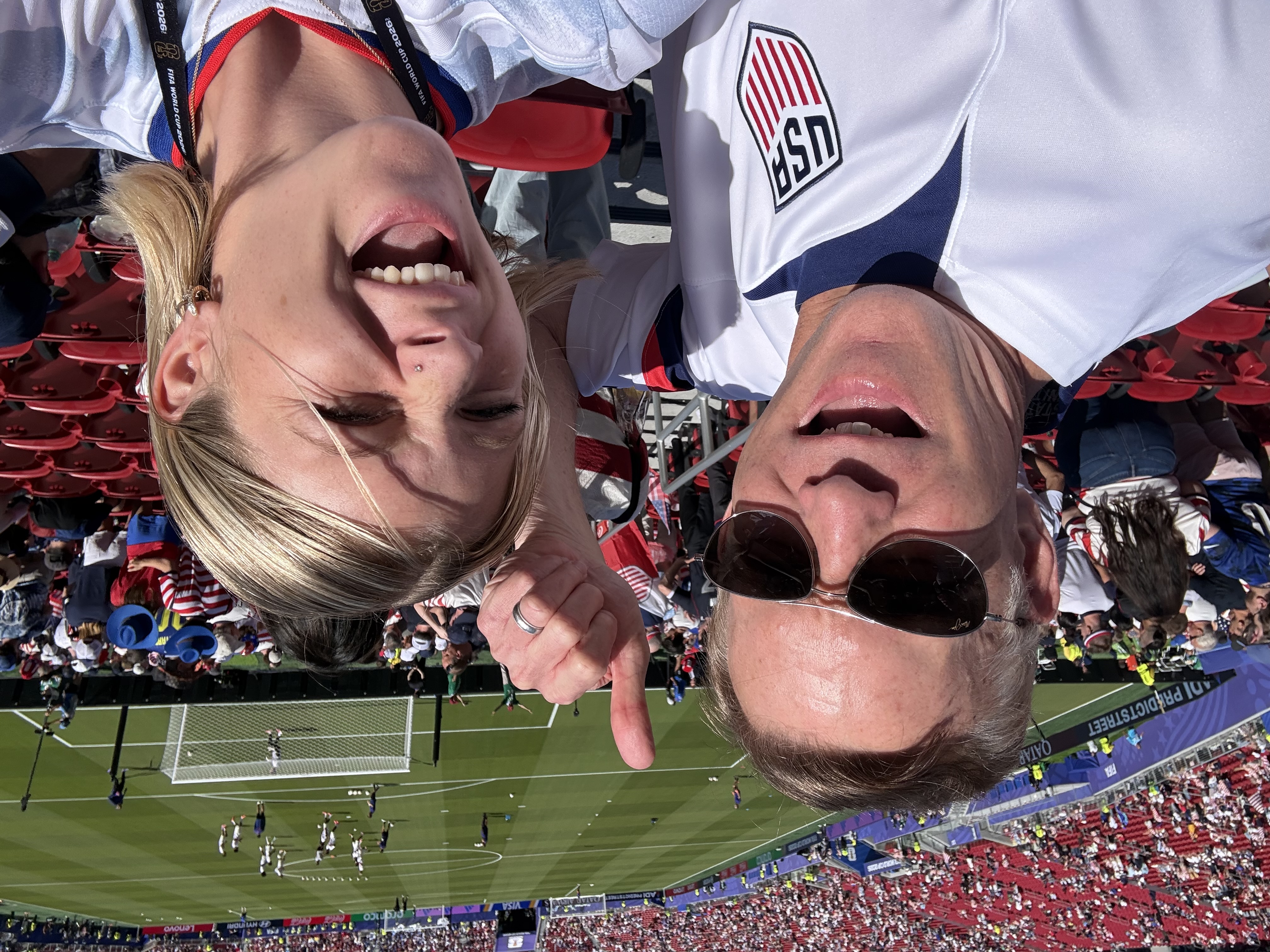 Dad and daughter smiling for selfie