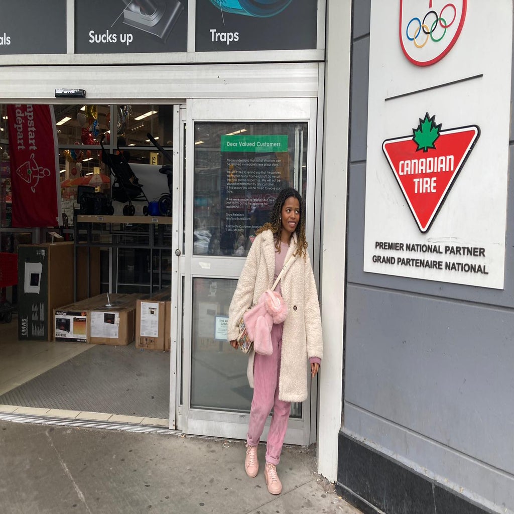 Girl in front of Canadian Tire
