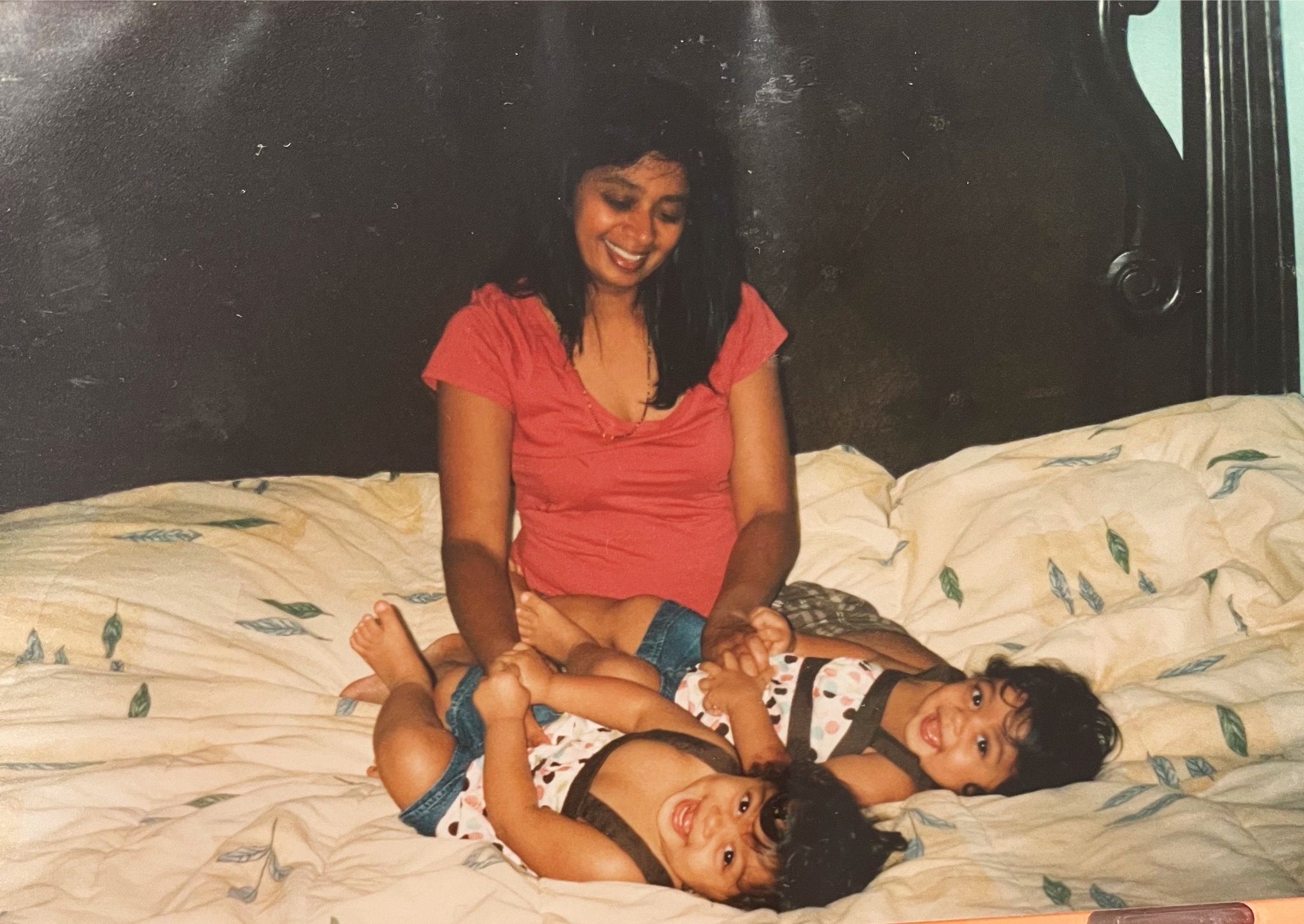 My mom and my twin and I when we were little