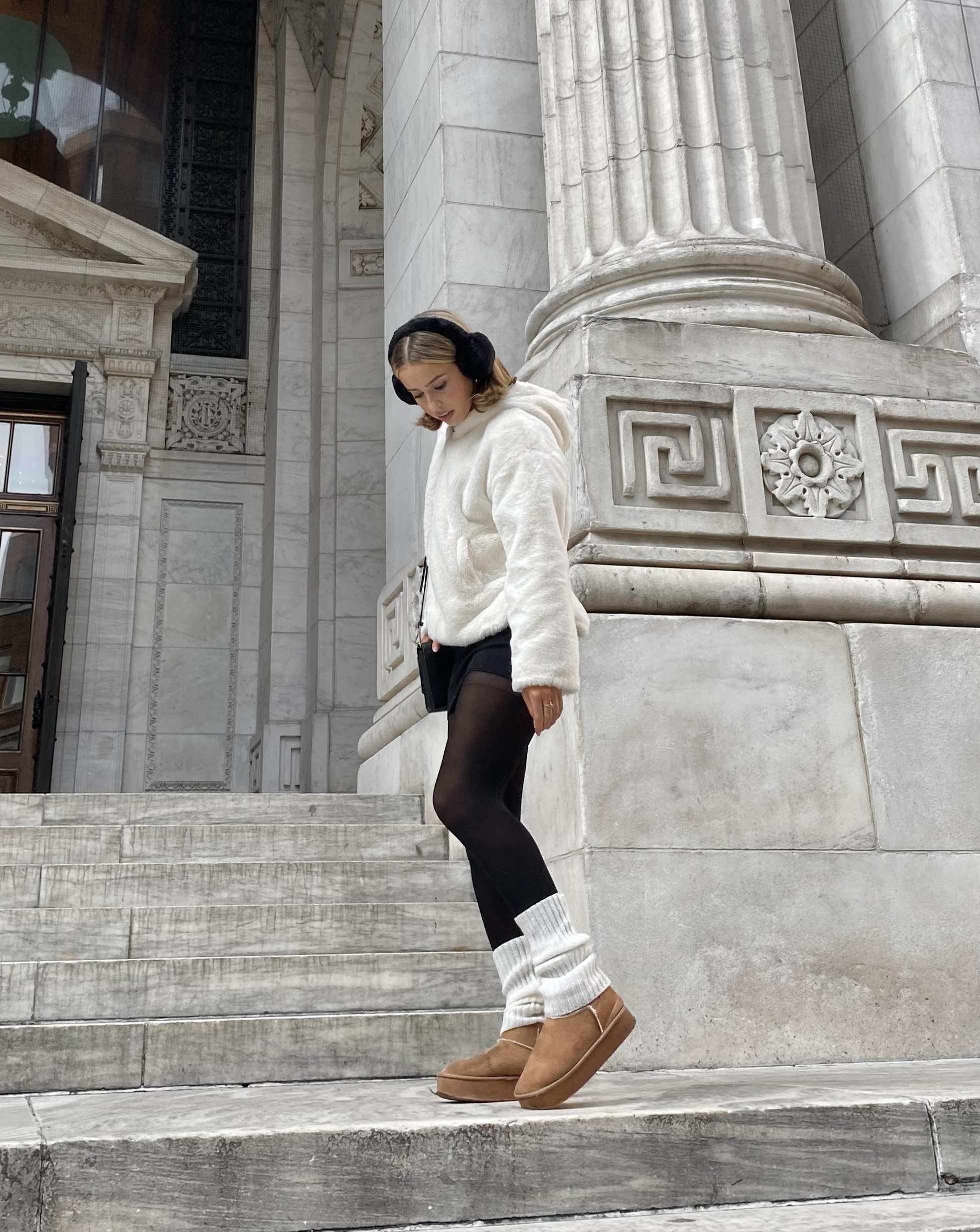 woman standing on stairs