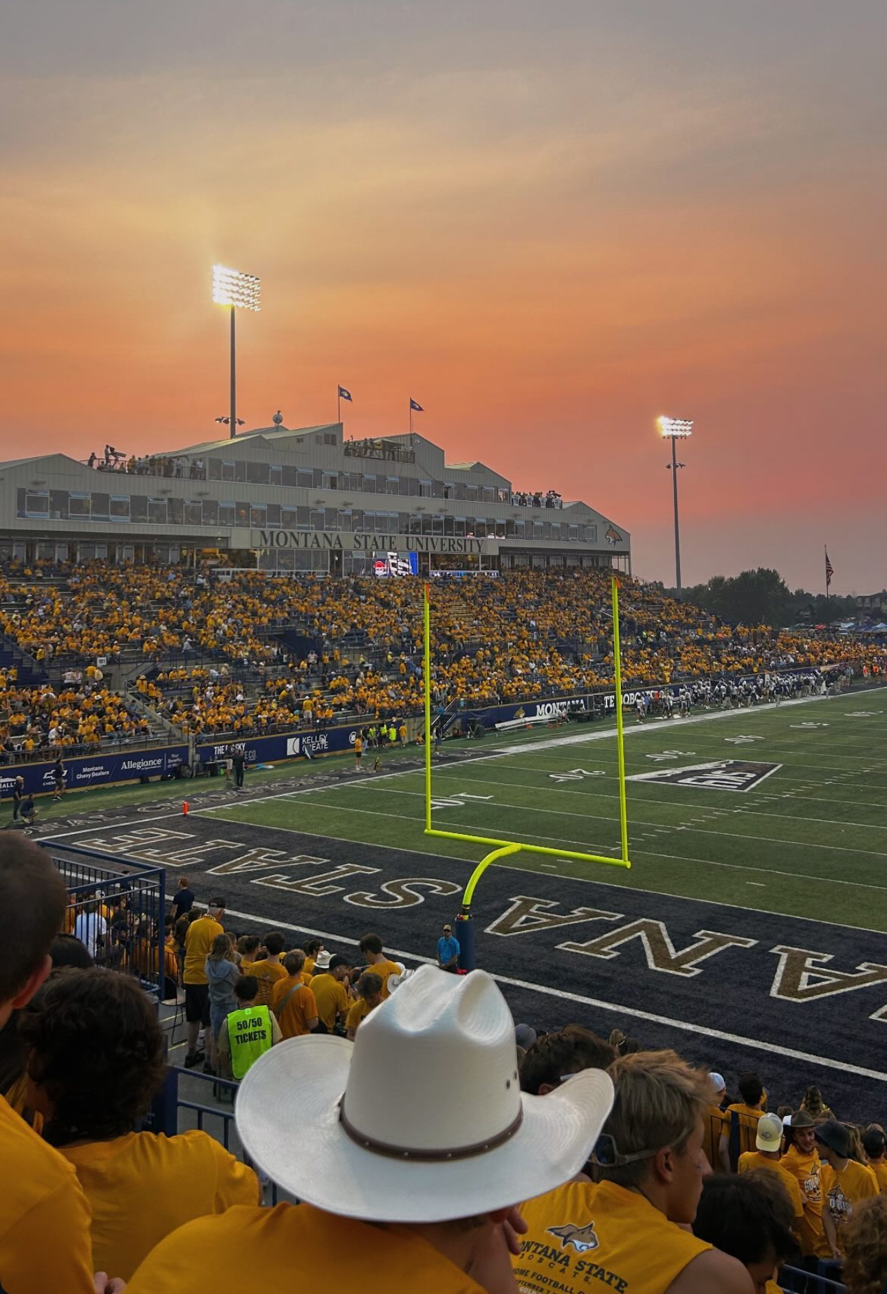 Montana State University football game at sunset
