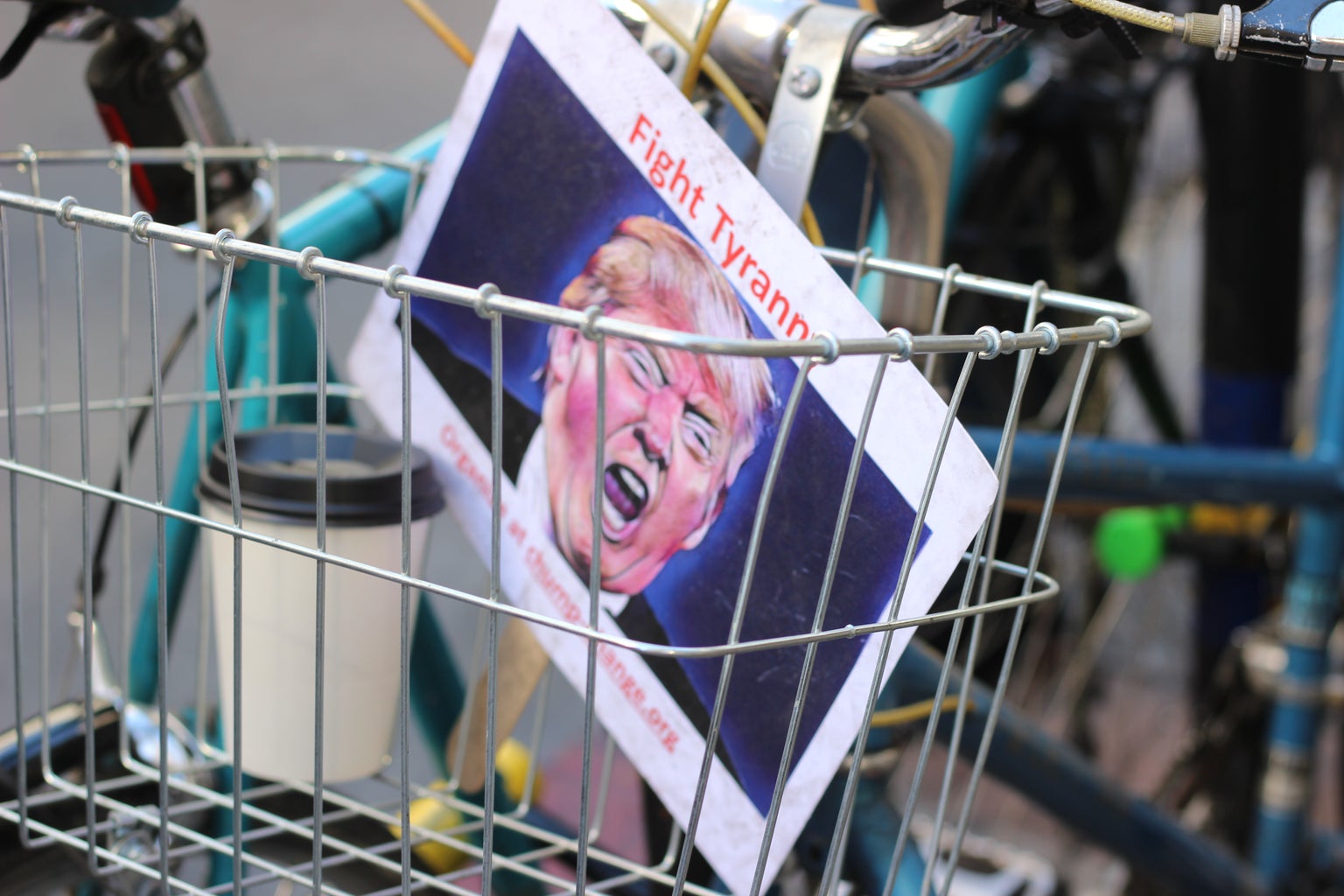 Donald Trump sign in bicycle cart