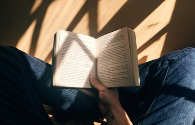 person holding book