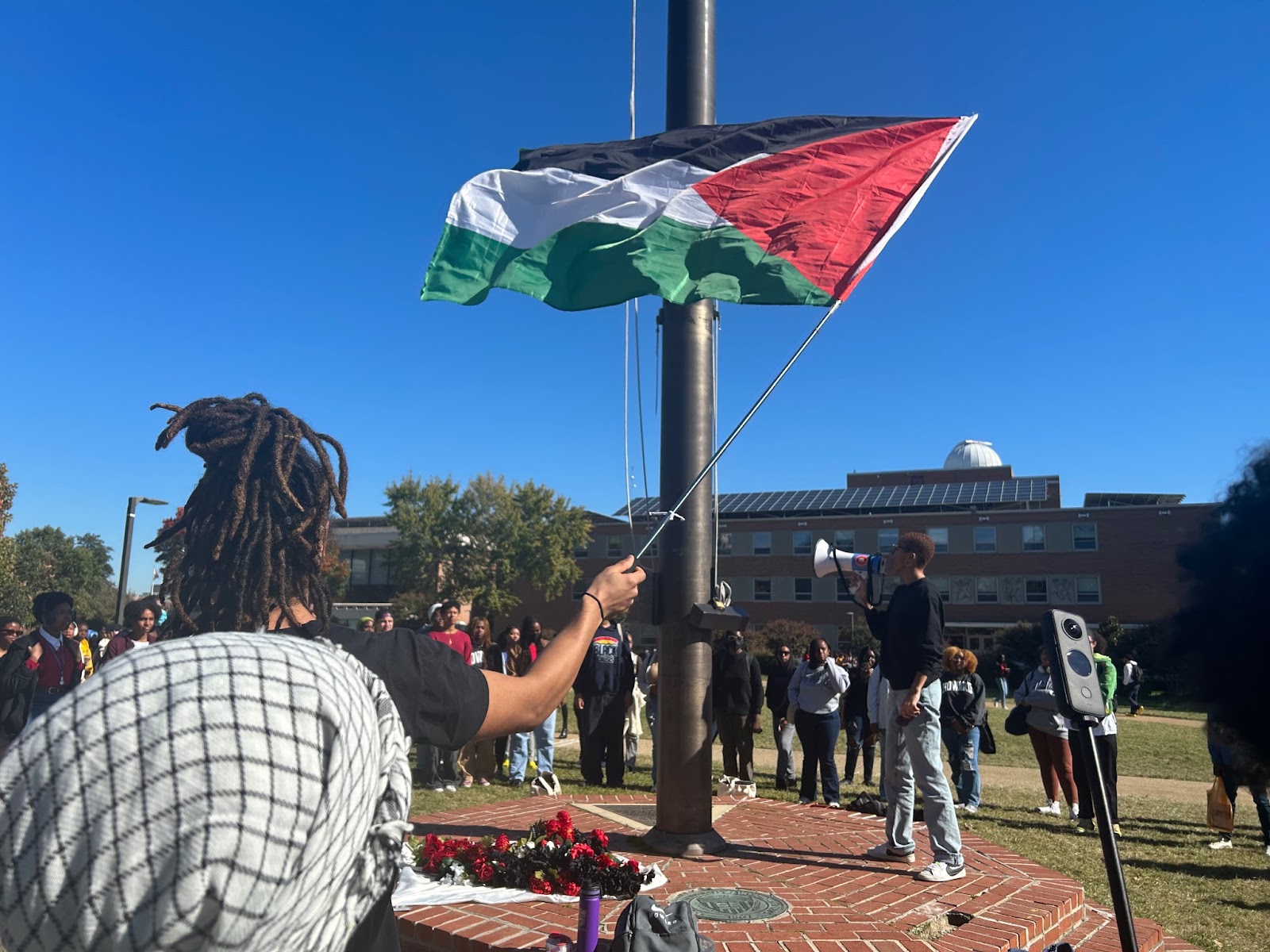 Howard University’s Students for Justice in Palestine organization leaders opening event to introduce student speakers.